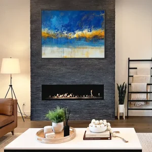 Abstract painting of a stormy sky with dynamic brush strokes and blue-gold composition