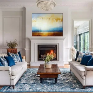 Abstraktní obraz krajiny při západu slunce s teplými zlatými tóny.