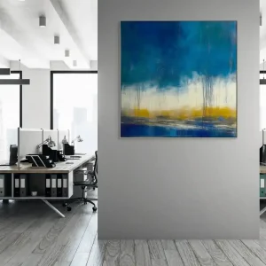 The abstract painting with a blue and white landscape captures drama and depth with rich colours.