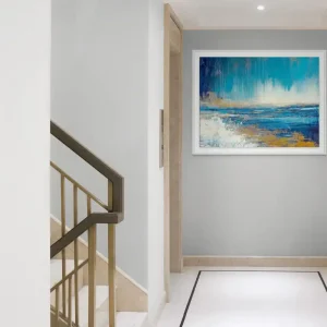 The abstract image of the sea depicts the dynamics of the ocean in intense blue tones.