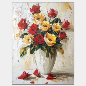 Image of flowers in a white vase with red and yellow roses on a light background