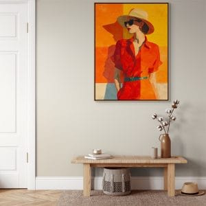 Moderní obraz ženy v červených šatech a slaměném klobouku na oranžovém pozadí